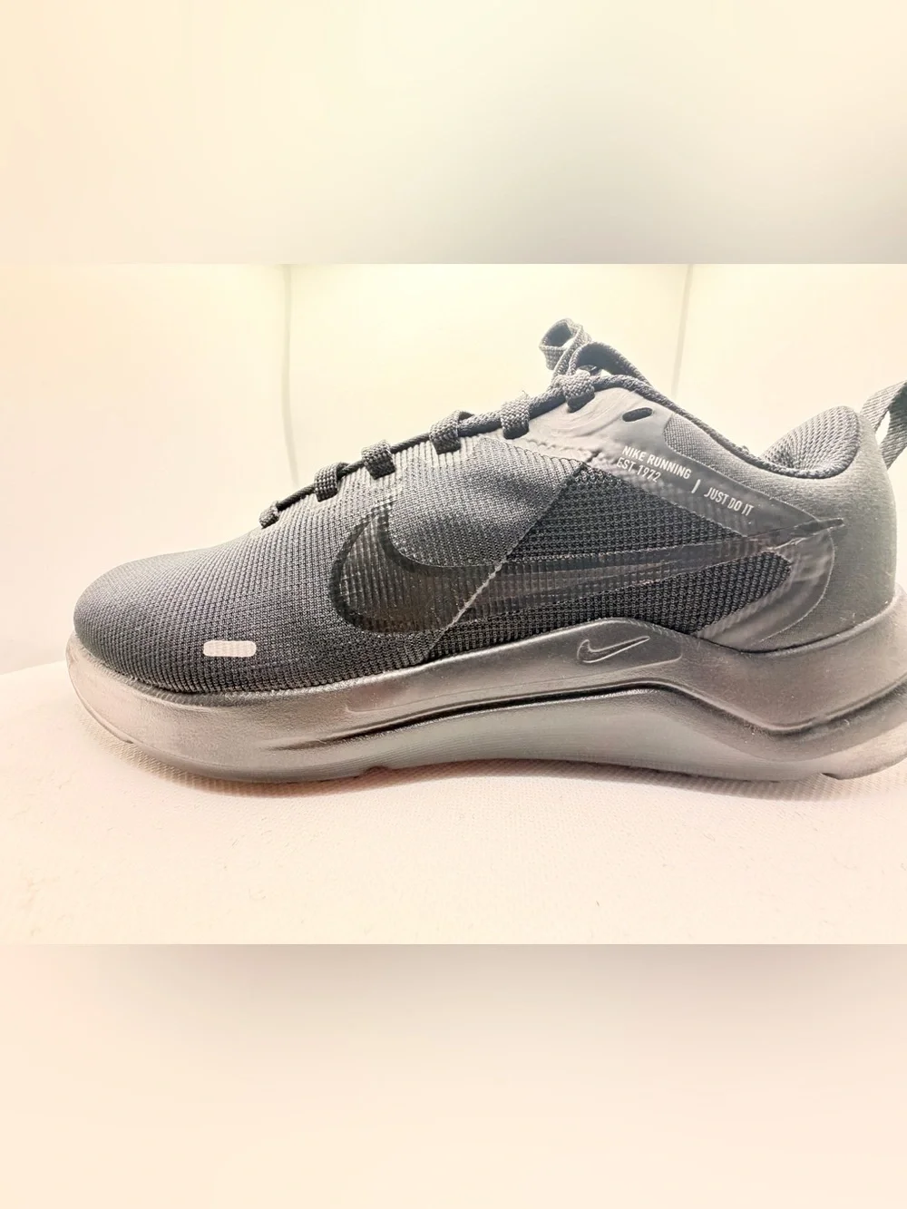 Nike women’s triple Black Low-Top Athletic Sneaker